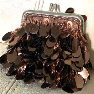 BCBG MaxAzria coin purse. Brown with sequence.